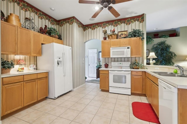 13813 Sigler St, Riverview, FL 33579 - kitchen with a ceiling fan, white appliances, a sink, arched walkways, and light countertops