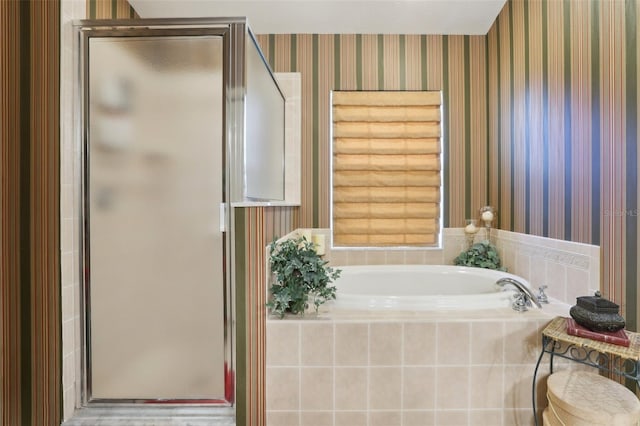 13813 Sigler St, Riverview, FL 33579 - bathroom featuring a stall shower, a bath, and wallpapered walls