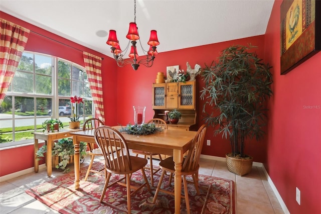 13813 Sigler St, Riverview, FL 33579 - dining area with a wealth of natural light, baseboards, light tile patterned floors, and a notable chandelier