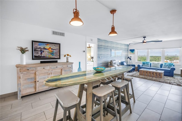 dining room featuring a ceiling fan