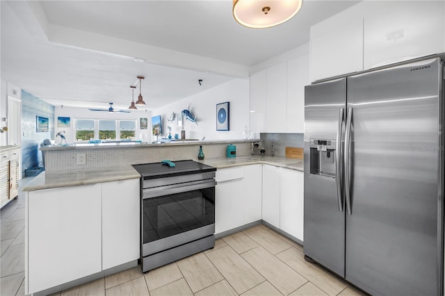 kitchen with stainless steel appliances, a peninsula, white cabinetry, decorative backsplash, and modern cabinets