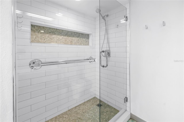 bathroom featuring a stall shower