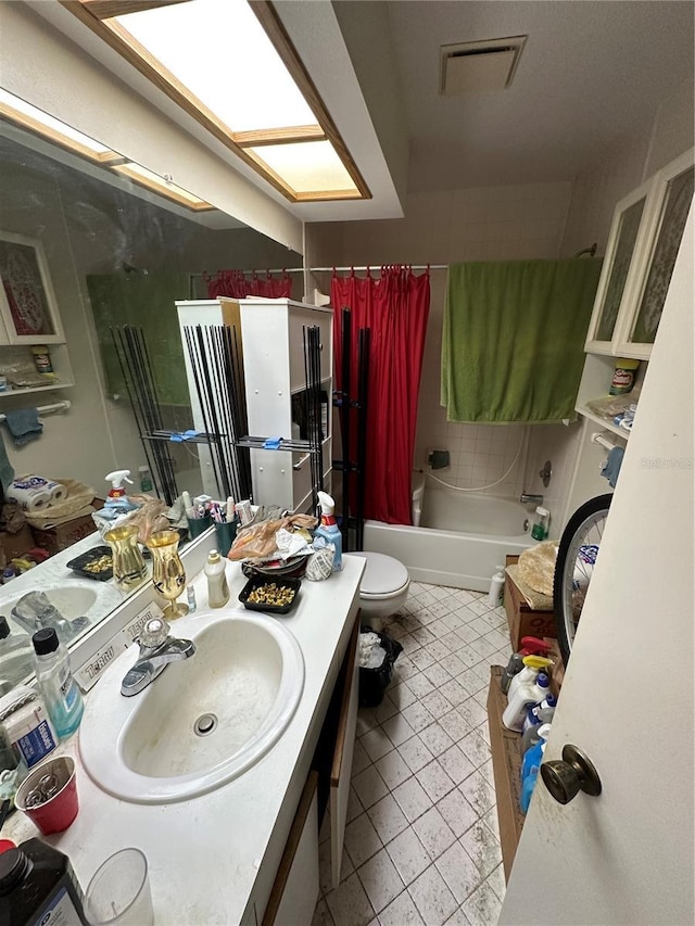135 Pinewinds Blvd, Oldsmar, FL 34677 - bathroom with vanity, shower / bathtub combination with curtain, and tile patterned floors