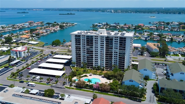 400 Island Way Unit 1709, Clearwater Beach, FL 33767 - drone / aerial view of a large body of water, apartment complex, and a pool