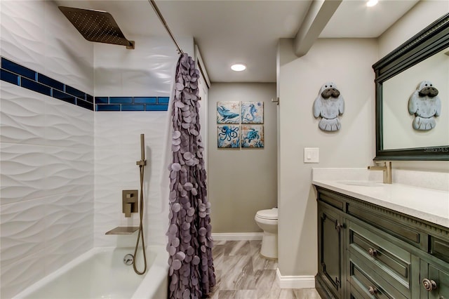 400 Island Way Unit 1709, Clearwater Beach, FL 33767 - bathroom featuring vanity, shower / bath combo, toilet, and baseboards