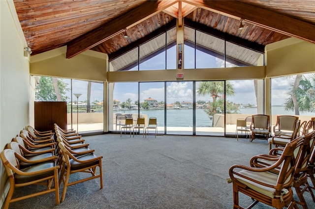 400 Island Way Unit 1709, Clearwater Beach, FL 33767 - sunroom featuring carpet flooring, a water view, wooden ceiling with exposed beams, and high vaulted ceiling