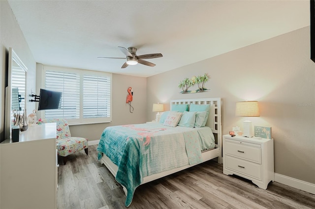 400 Island Way Unit 1709, Clearwater Beach, FL 33767 - bedroom with light wood-type flooring and a ceiling fan
