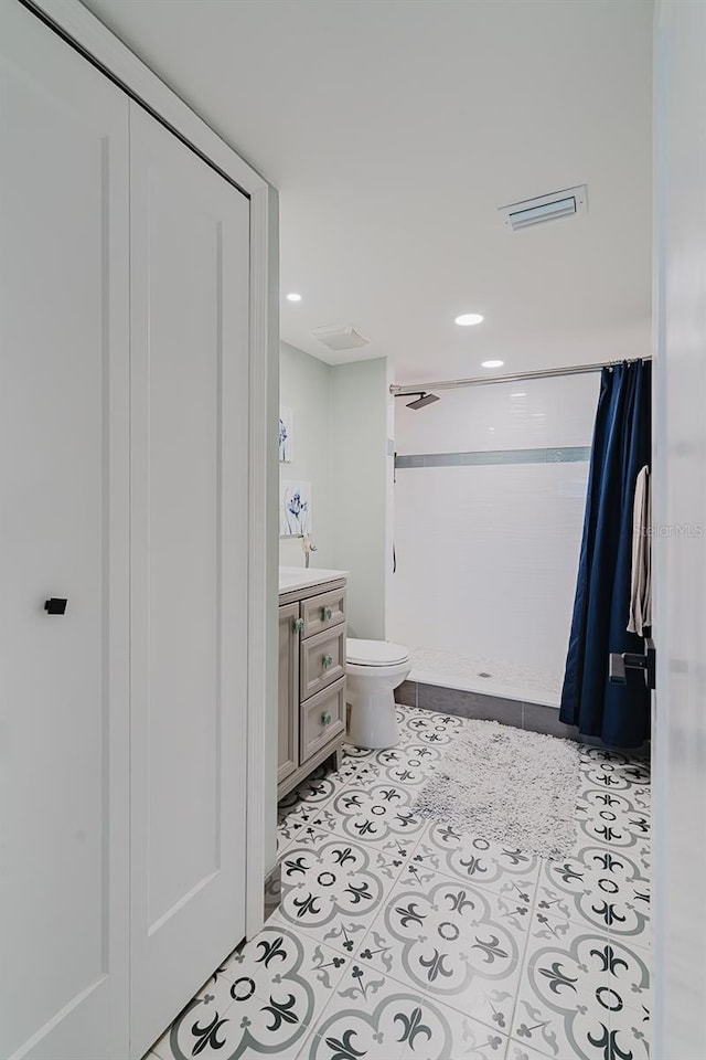 400 Island Way Unit 1709, Clearwater Beach, FL 33767 - full bathroom with a stall shower, vanity, and tile patterned floors