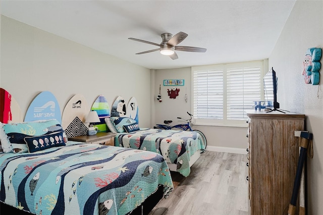 400 Island Way Unit 1709, Clearwater Beach, FL 33767 - bedroom featuring wood finished floors and a ceiling fan