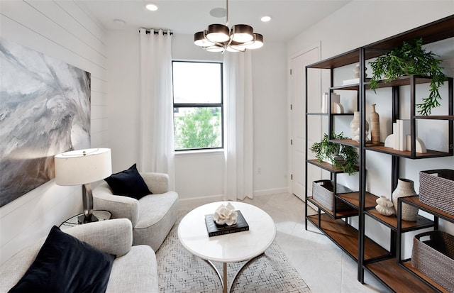 sitting room featuring a chandelier and recessed lighting