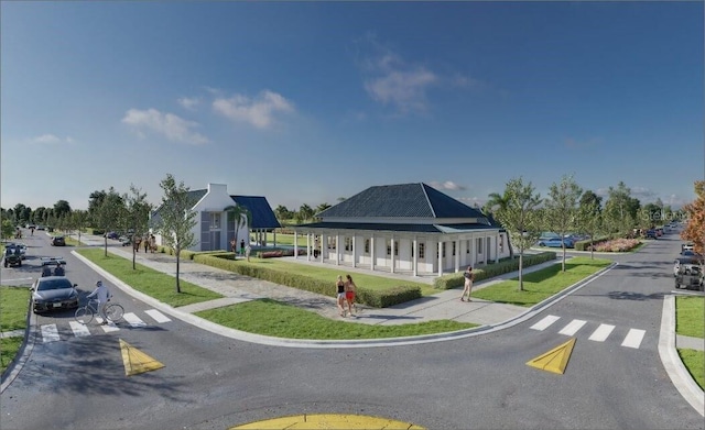 view of asphalt street with curbs and sidewalks