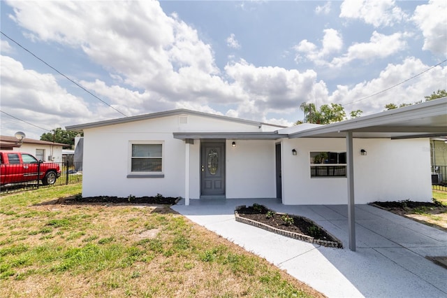 5210 S 80th St, Tampa, FL 33619 - single story home with stucco siding and fence