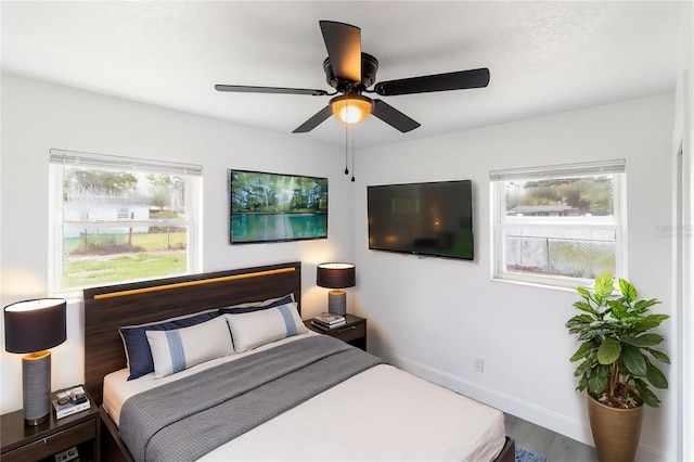 5210 S 80th St, Tampa, FL 33619 - bedroom with baseboards and ceiling fan