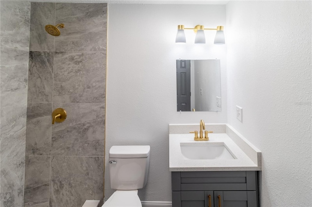 5210 S 80th St, Tampa, FL 33619 - bathroom with a tile shower, vanity, and toilet