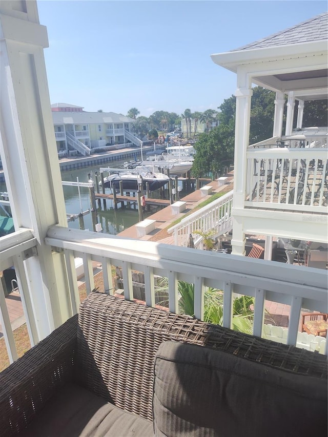 balcony featuring a water view