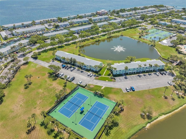 birds eye view of property featuring a water view