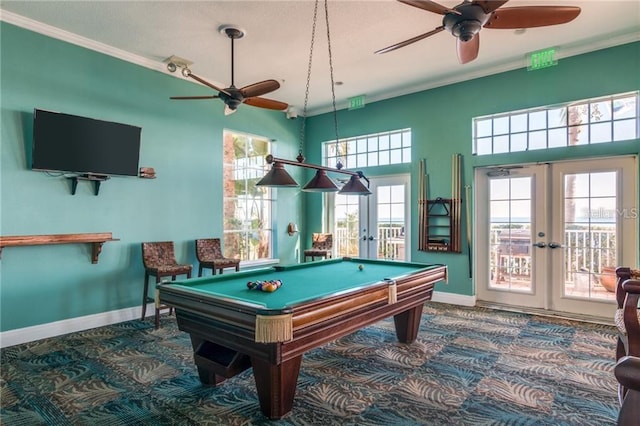 recreation room featuring french doors, ceiling fan, carpet flooring, baseboards, and ornamental molding