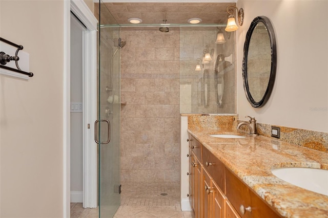 315 Ridge Rd, Palm Harbor, FL 34683 - bathroom with a shower stall, double vanity, and tile patterned flooring