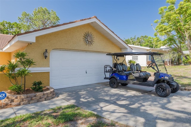 315 Ridge Rd, Palm Harbor, FL 34683 - view of front of house with stucco siding, driveway, a tile roof, and an attached garage