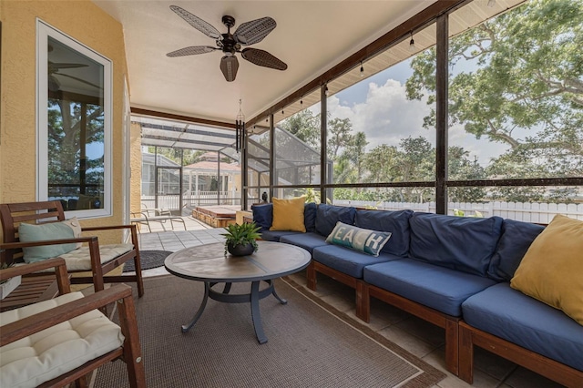 315 Ridge Rd, Palm Harbor, FL 34683 - sunroom featuring ceiling fan and an outdoor hangout area