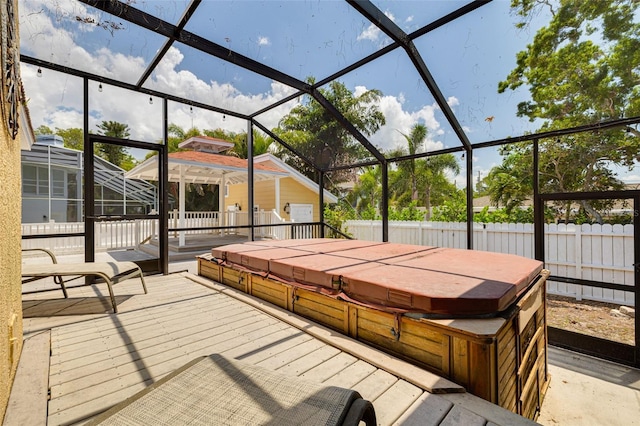 315 Ridge Rd, Palm Harbor, FL 34683 - view of patio / terrace with a covered hot tub, a wooden deck, and a lanai