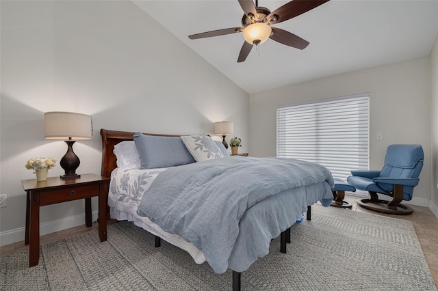 315 Ridge Rd, Palm Harbor, FL 34683 - bedroom with vaulted ceiling, baseboards, and ceiling fan