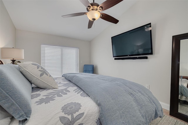 315 Ridge Rd, Palm Harbor, FL 34683 - bedroom featuring lofted ceiling, wood finished floors, baseboards, and ceiling fan
