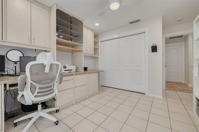 315 Ridge Rd, Palm Harbor, FL 34683 - office space featuring a ceiling fan, light tile patterned floors, recessed lighting, built in desk, and baseboards