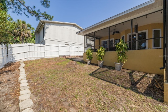 315 Ridge Rd, Palm Harbor, FL 34683 - view of yard featuring a ceiling fan and a sunroom