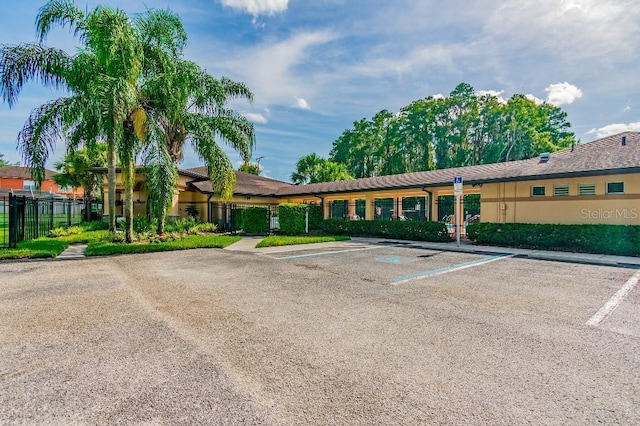 27012 Sea Breeze Way, Wesley Chapel, FL 33544 - view of property featuring uncovered parking