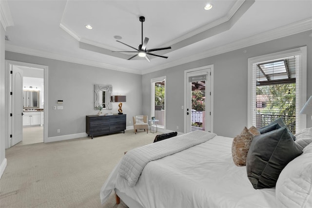 bedroom featuring a tray ceiling, access to outside, light colored carpet, crown molding, and baseboards