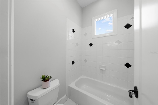 full bath featuring toilet and  shower combination