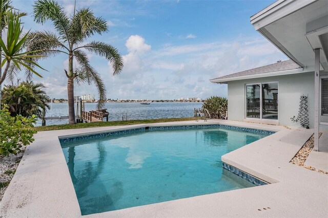 7092 S Shore Dr S, Saint Petersburg, FL 33707 - outdoor pool featuring a water view and a boat dock