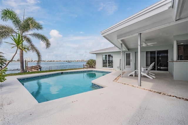 7092 S Shore Dr S, Saint Petersburg, FL 33707 - outdoor pool featuring a patio area, a water view, and a ceiling fan