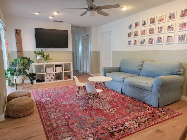 7092 S Shore Dr S, Saint Petersburg, FL 33707 - living room featuring wood finished floors and ceiling fan