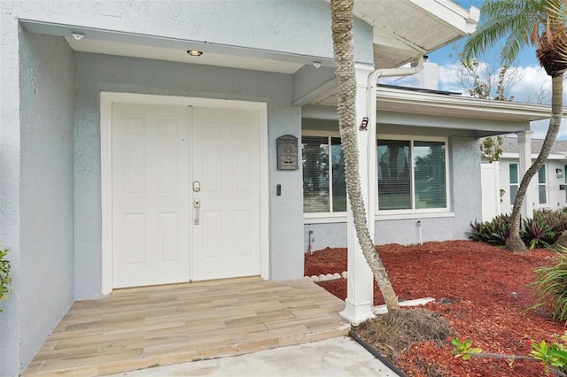 6010 Bayou Grande Blvd NE, Saint Petersburg, FL 33703 - property entrance featuring stucco siding
