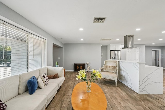 6010 Bayou Grande Blvd NE, Saint Petersburg, FL 33703 - living room with wood finished floors and recessed lighting