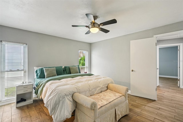 6010 Bayou Grande Blvd NE, Saint Petersburg, FL 33703 - bedroom featuring light wood-style floors and a ceiling fan