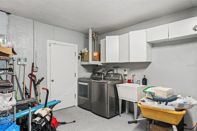6010 Bayou Grande Blvd NE, Saint Petersburg, FL 33703 - laundry room featuring separate washer and dryer and cabinet space