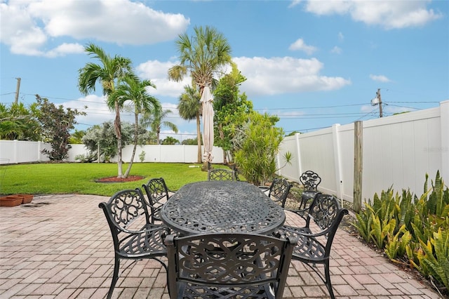6010 Bayou Grande Blvd NE, Saint Petersburg, FL 33703 - fenced backyard with outdoor dining area and a patio area