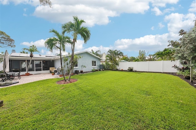 6010 Bayou Grande Blvd NE, Saint Petersburg, FL 33703 - fenced backyard featuring a sunroom and a patio area