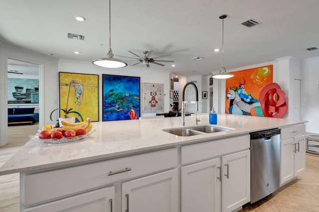 915 Tidewater Shores Loop, Bradenton, FL 34208 - kitchen with stainless steel dishwasher, a sink, white cabinets, recessed lighting, and crown molding