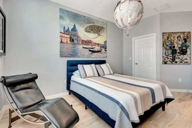 915 Tidewater Shores Loop, Bradenton, FL 34208 - bedroom featuring wood finished floors and baseboards