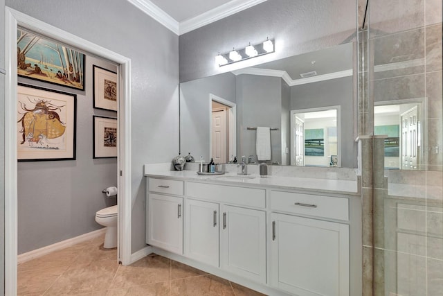 915 Tidewater Shores Loop, Bradenton, FL 34208 - bathroom with ornamental molding, toilet, vanity, tile patterned flooring, and baseboards