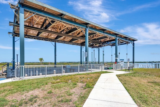 915 Tidewater Shores Loop, Bradenton, FL 34208 - view of property's community with a water view and a lawn