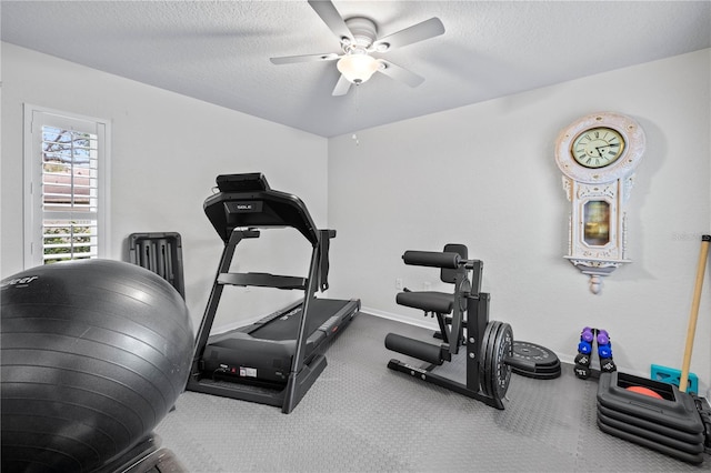 5296 Slater Rd, Spring Hill, FL 34608 - exercise room featuring ceiling fan and a textured ceiling