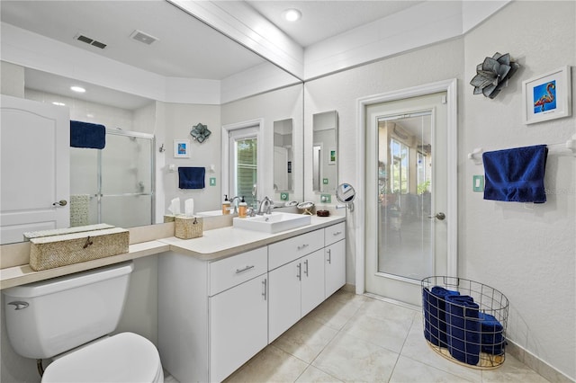 5296 Slater Rd, Spring Hill, FL 34608 - full bath with vanity, a shower stall, tile patterned floors, and a textured wall