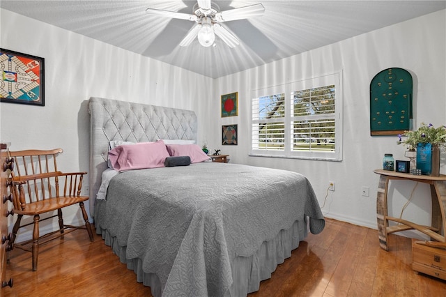 5296 Slater Rd, Spring Hill, FL 34608 - bedroom with hardwood / wood-style floors and a ceiling fan