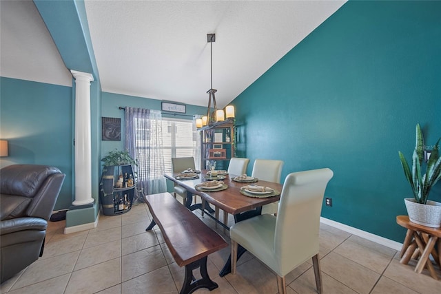 35819 Diamond Head Ct, Zephyrhills, FL 33541 - dining area featuring ornate columns, lofted ceiling, baseboards, and light tile patterned floors