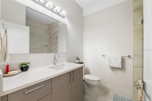 4108 N Thatcher, Tampa, FL 33614 - bathroom featuring marble look tile flooring, a marble finish shower, vanity, baseboards, and toilet